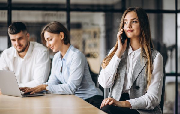Group of people working out business plan in an office